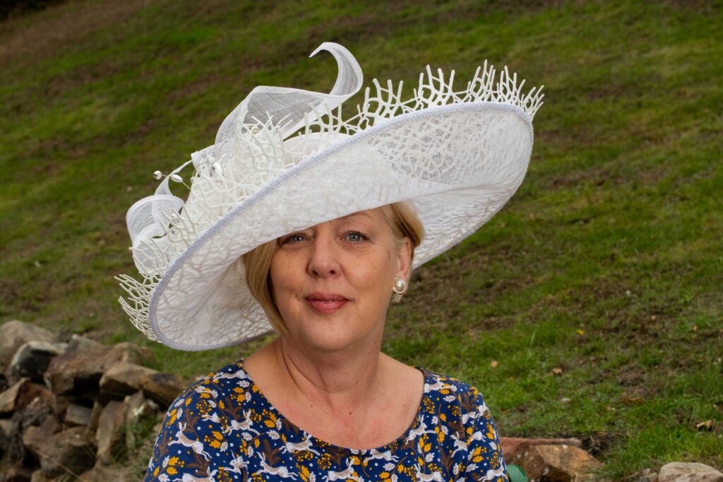 Gallery-Sherry-08 - Hats by Sherry Hat design called winter, inspired by Beast from the East in the Winter of 2028 shows lacey white forms and selected for the World Garden Exhibition at London Hat Week.